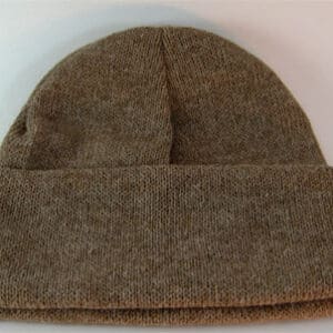 A brown hat is on the floor